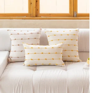 housse coussin jaune et blanc