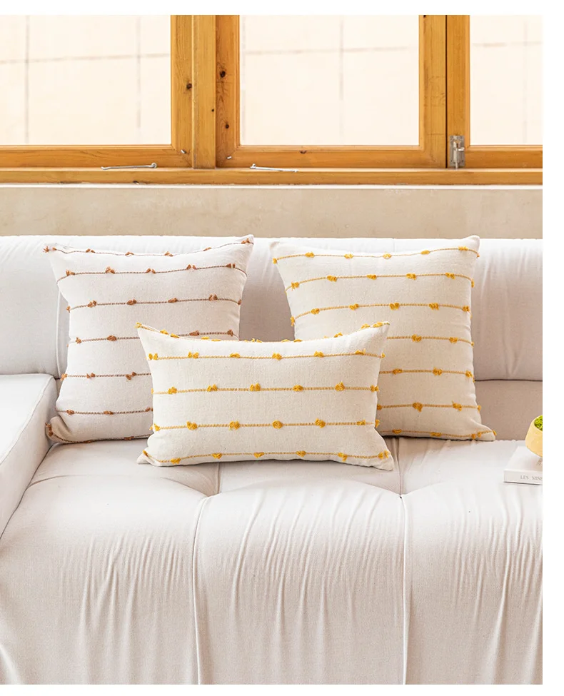 housse coussin jaune et blanc